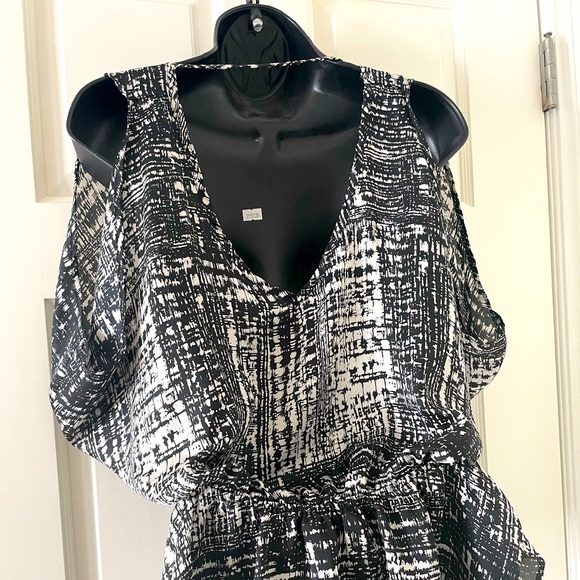 Cherish peplum blouse with cold shoulder and open back. - Picture 2 of 3